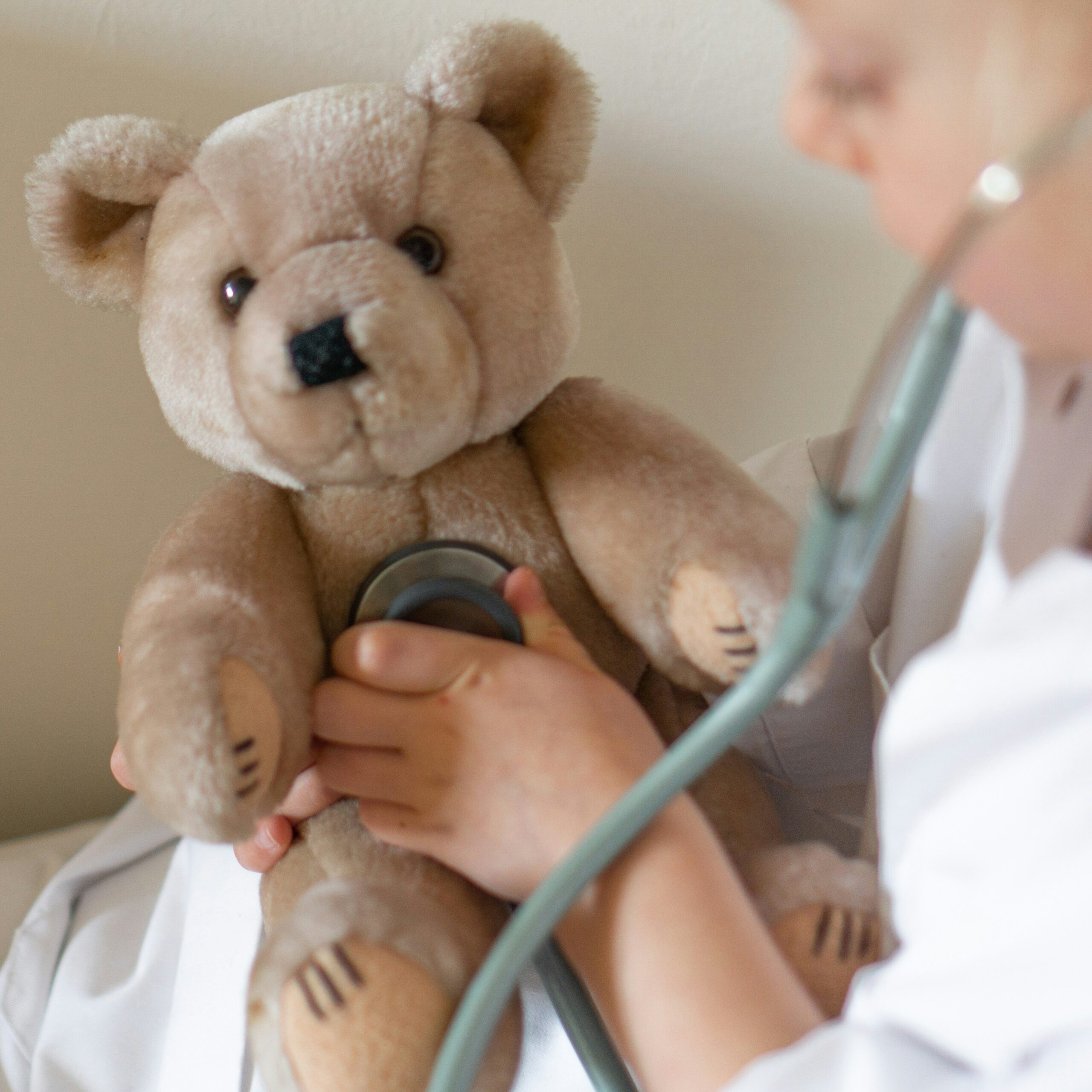 Doctor with a teddy bear